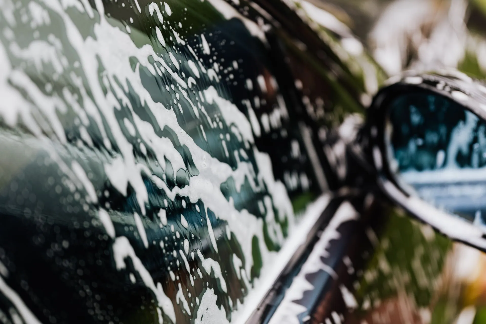 Foam sheeting down a side window and wing mirror.